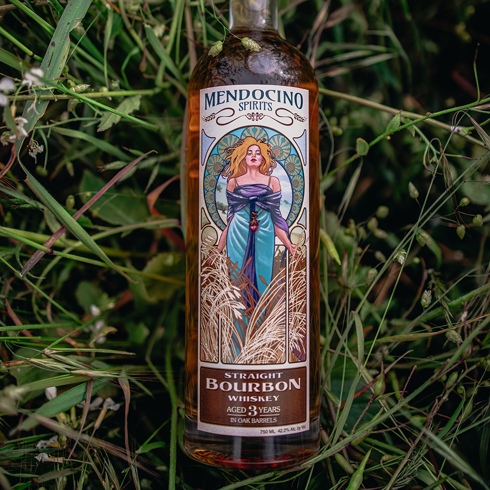 Bottle of Mendocino Spirits Straight Bourbon Whiskey in a grassy setting